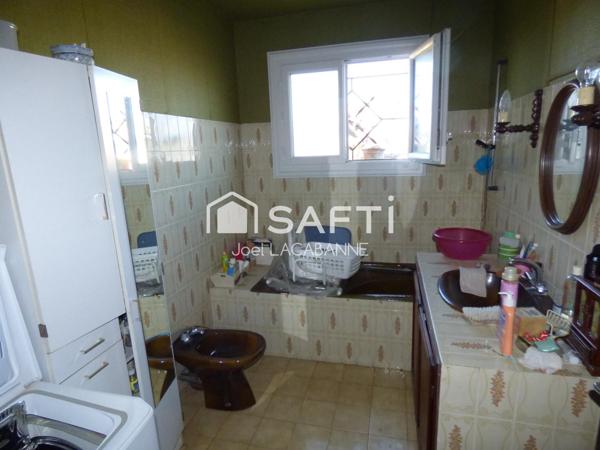 Maison de village de 100 m², sous sol, cuisine aménagée, 3 chambres, véranda