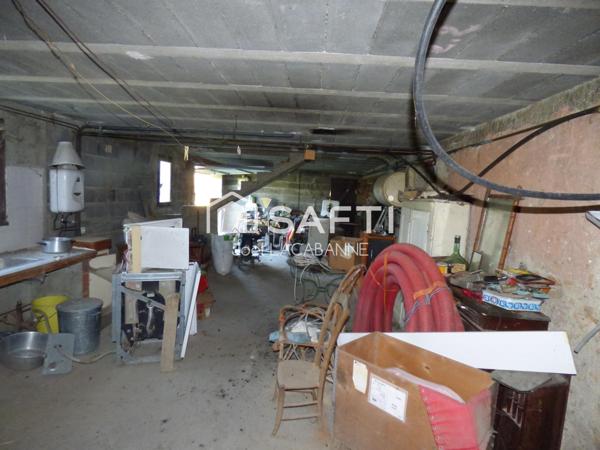 Maison de village de 100 m², sous sol, cuisine aménagée, 3 chambres, véranda