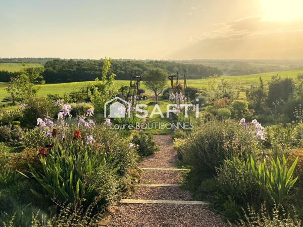 Maison avec une vue panoramique sur la campagne