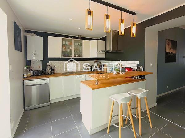 Un cocon lumineux en plein cœur de ville avec jardin.