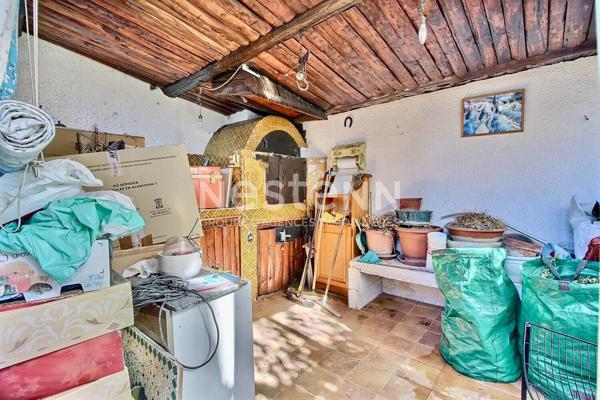 Marignane- Appartement 3/4 pièces d'une surface de 78 m² avec une véranda et un jardin.