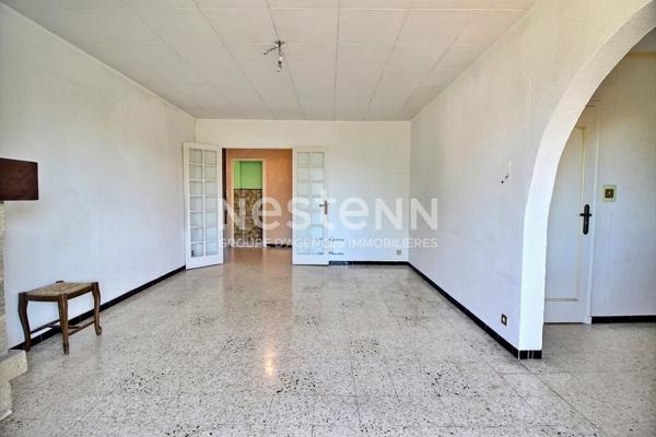 Marignane- Appartement 3/4 pièces d'une surface de 78 m² avec une véranda et un jardin.