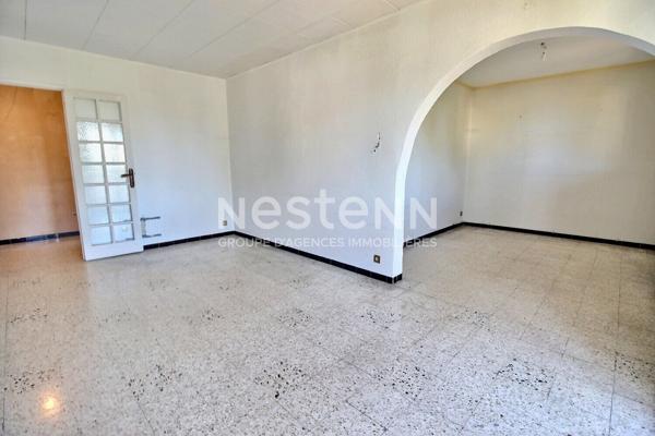 Marignane- Appartement 3/4 pièces d'une surface de 78 m² avec une véranda et un jardin.