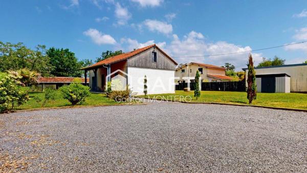 Maison moderne avec dépendance aménageable sur une belle parcelle à Gastes