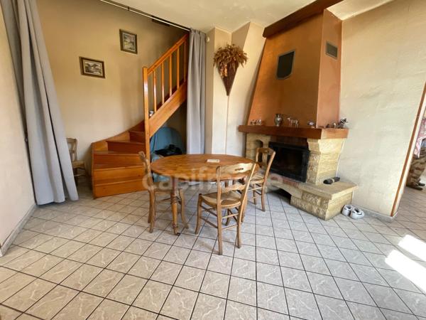 Maison 1 chambre, grenier aménageable, grand garage.
