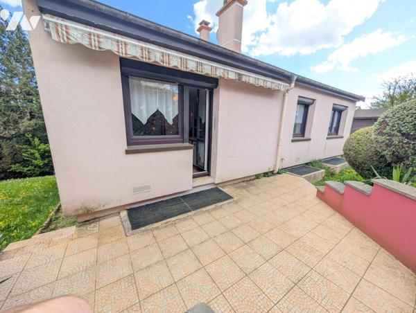 Maison T6 avec jardin et garage en sous-sol