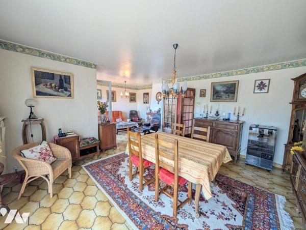 Maison T6 avec jardin et garage en sous-sol