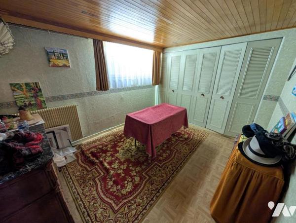 Maison T6 avec jardin et garage en sous-sol