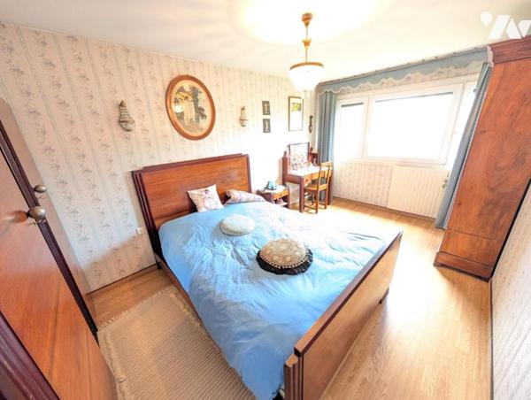 Maison T6 avec jardin et garage en sous-sol