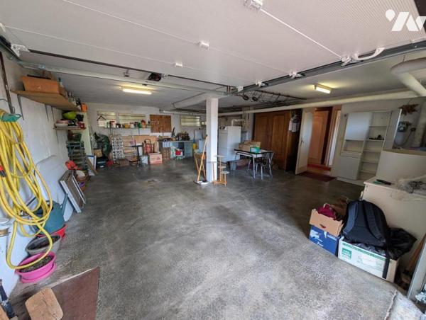 Maison T6 avec jardin et garage en sous-sol
