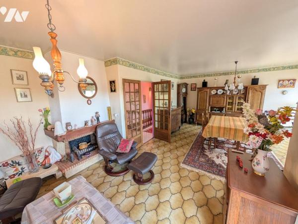 Maison T6 avec jardin et garage en sous-sol