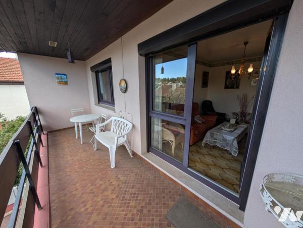 Maison T6 avec jardin et garage en sous-sol