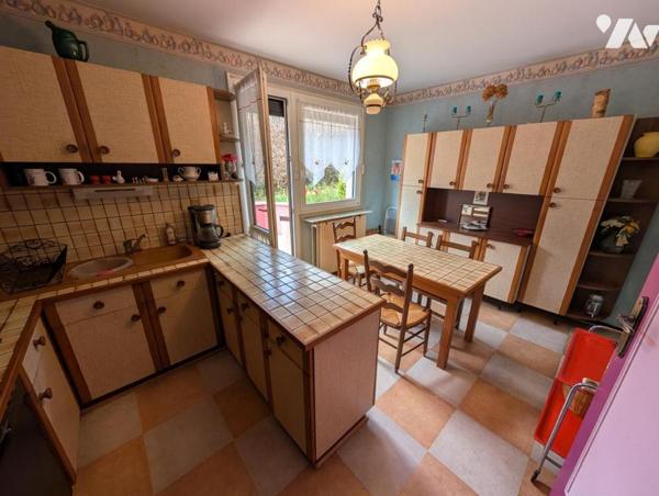 Maison T6 avec jardin et garage en sous-sol