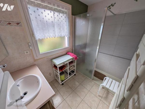 Maison T6 avec jardin et garage en sous-sol