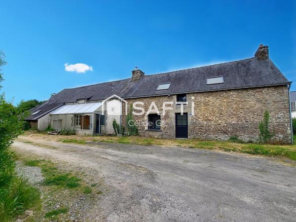 Grande longère située au cœur du bourg de Lantillac