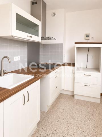 Appartement T5 avec balcon loggia, cave et  1 place de parking privatif
