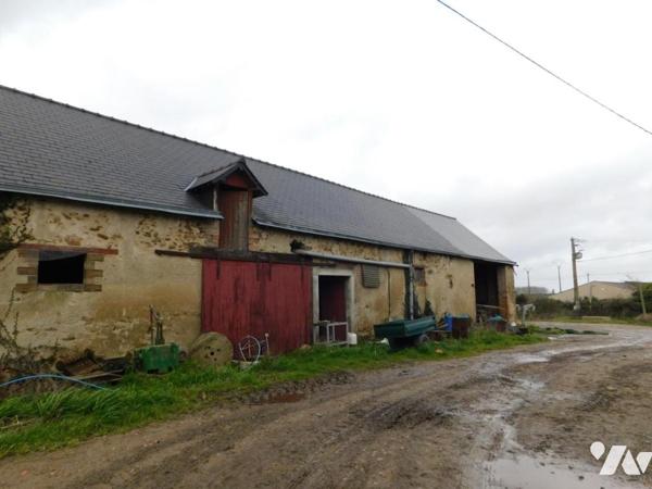 Parcelle de terres avec bâtiments