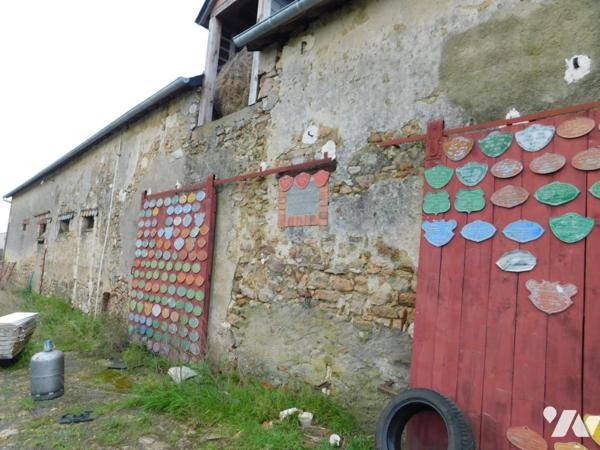 Parcelle de terres avec bâtiments