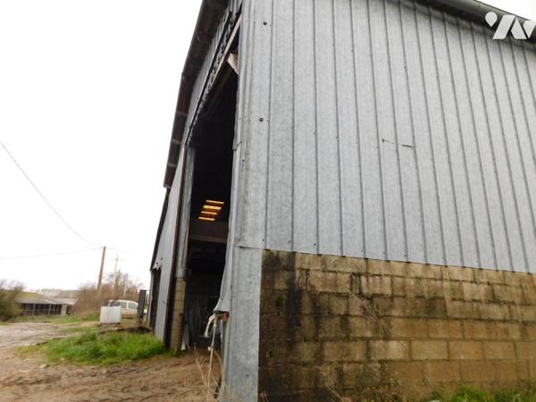 Parcelle de terres avec bâtiments