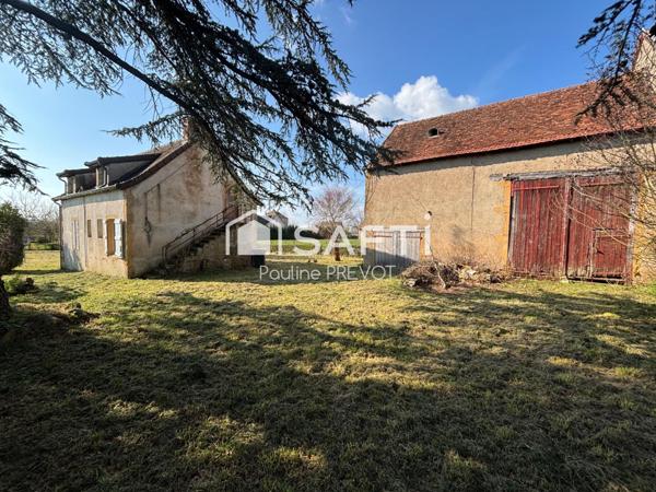 Maison de campagne avec vue dégagée, 3 chambres et beau potentiel.
