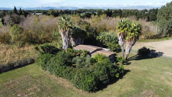 Fond de commerce avec 10 hectares de terrain ,