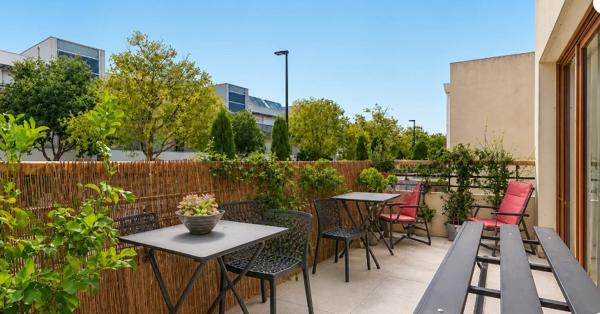 T4 96 m² – 3 chambres – Terrasse 20 m² – Garage double