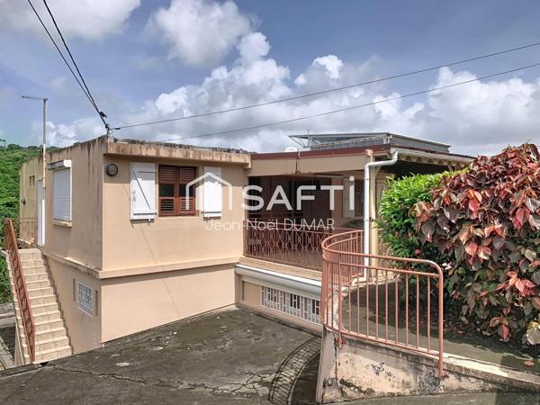 Maison de rapport à rafraîchir à 10 mn du CHU