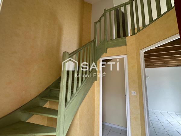 Duplex avec jardin privatif et stationnement