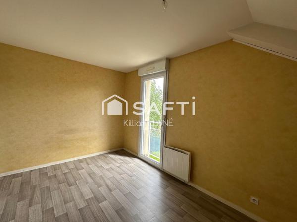 Duplex avec jardin privatif et stationnement