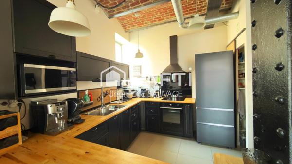 Loft avec cachet 106 m2 - 2 ch - Balcon -  parking