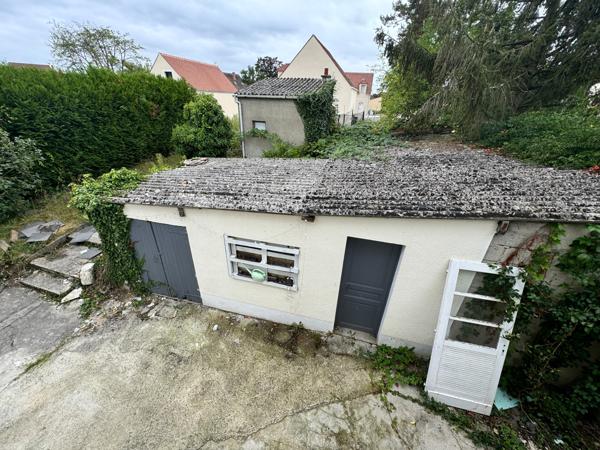 Maison à rénover avec cave et dépendances