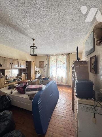 Maison individuelle avec grand terrain