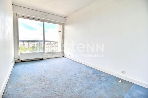 Appartement Courbevoie 3 pièces 70 m2 vue Paris et Tour Eiffel bonne exposition balcons étage élevé traversant proche commodités écoles transports