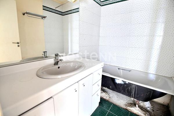 Appartement Courbevoie 3 pièces 70 m2 vue Paris et Tour Eiffel bonne exposition balcons étage élevé traversant proche commodités écoles transports