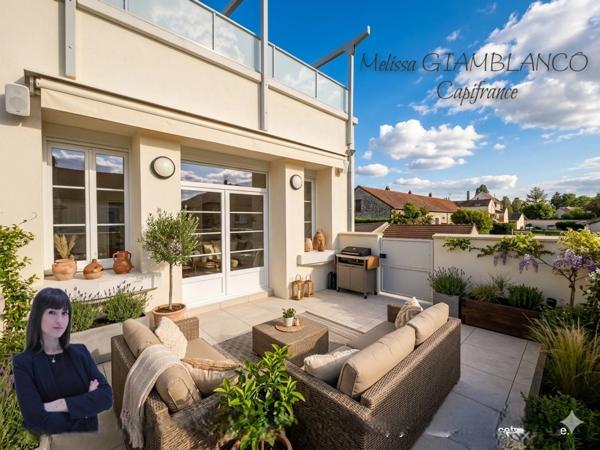 Appartement entièrement rénové avec terrasse et parking