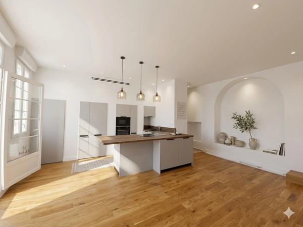 Appartement entièrement rénové avec terrasse et parking