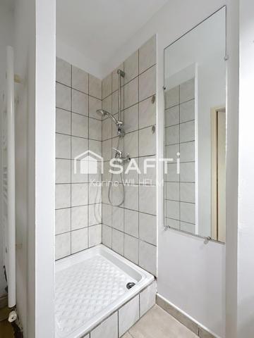 IMMEUBLE DE RAPPORT – 9 LOGEMENTS + 3 GARAGES – NEUFCHÂTEAU