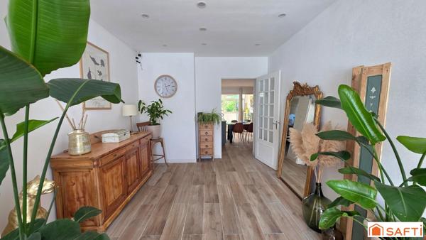 Maison T6 de 139m² entièrement rénovée, peu énergivore, DPE C, jardin et garage.