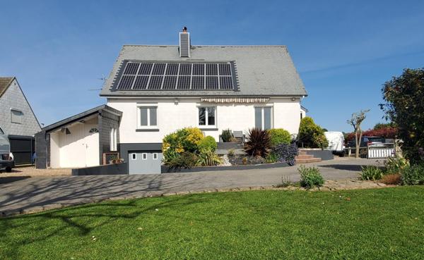 Maison traditionnelle de 127 m² sur sous sol avec garage  .