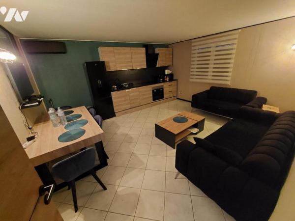 Un local professionnel d'environ 420 m² (équipé en alimentaire-froid)