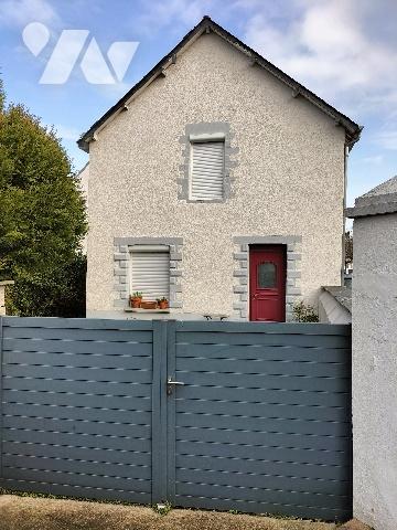 Maison comportant deux appartements