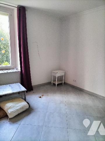 Maison comportant deux appartements