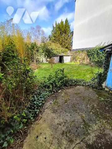 Maison comportant deux appartements