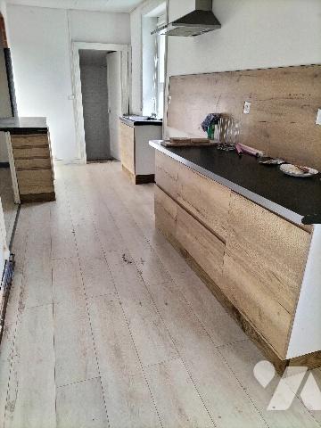 Maison comportant deux appartements