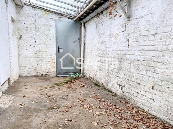 Maison de ville avec cour couverte et jardin