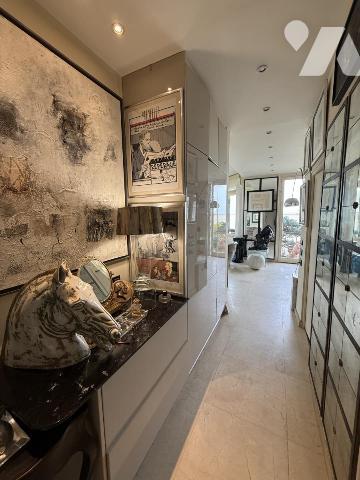 VENTE EN VIAGER APPARTEMENT HYPER CENTRE DINARD VUE MER JARDIN PRIVATIF PLACE DE PARKING EN SOUS SOL