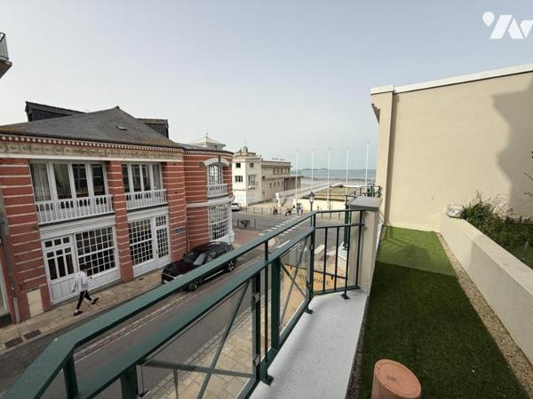 VENTE EN VIAGER APPARTEMENT HYPER CENTRE DINARD VUE MER JARDIN PRIVATIF PLACE DE PARKING EN SOUS SOL