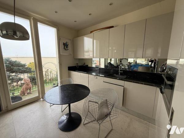 VENTE EN VIAGER APPARTEMENT HYPER CENTRE DINARD VUE MER JARDIN PRIVATIF PLACE DE PARKING EN SOUS SOL