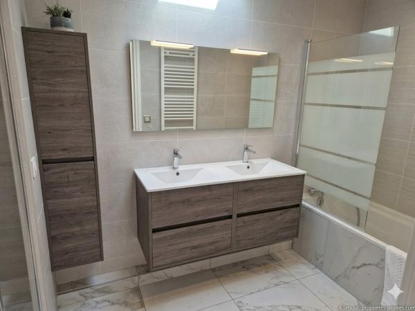 GRATTE CIEL -  ELEGANT T4 DE 105M² - BALCON A VIVRE - RESIDENCE DE STANDING AVEC  GARAGE ET CAVE