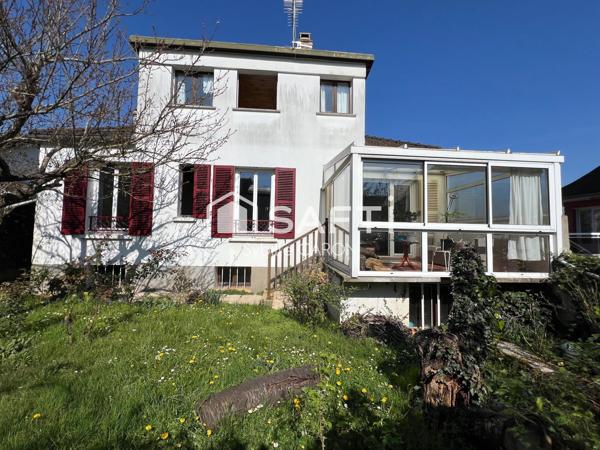 Maison spacieuse à rénover - Grand Garage
